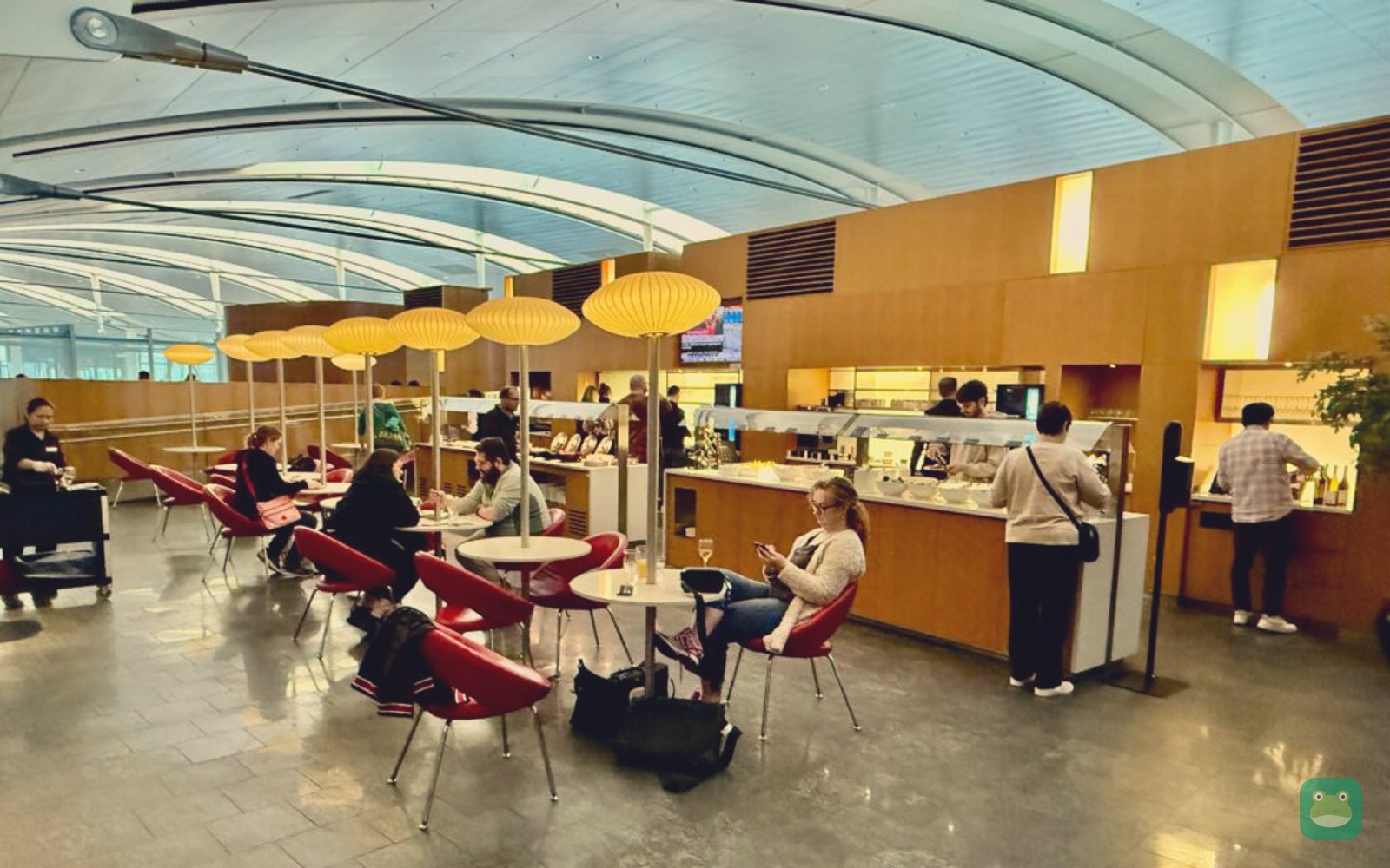 Air Canada Maple Leaf Lounge (International), YYZ Terminal 1 — dining tables near the buffet