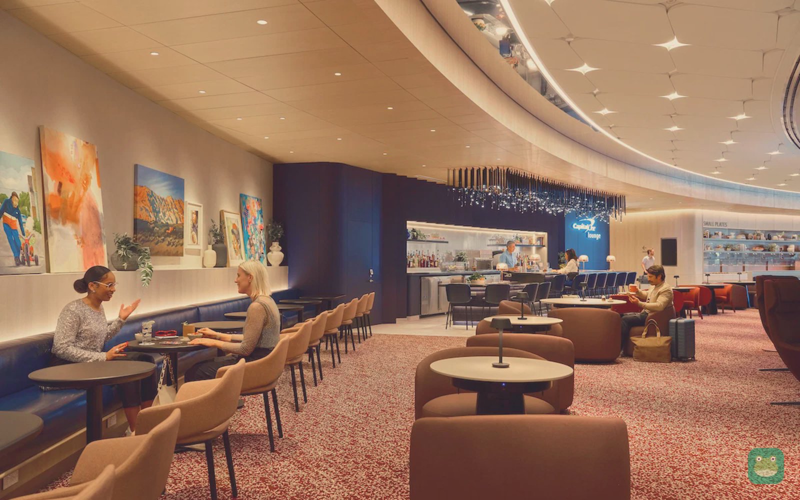 Capital One Lounge, LAS Concourse D — seating and bar