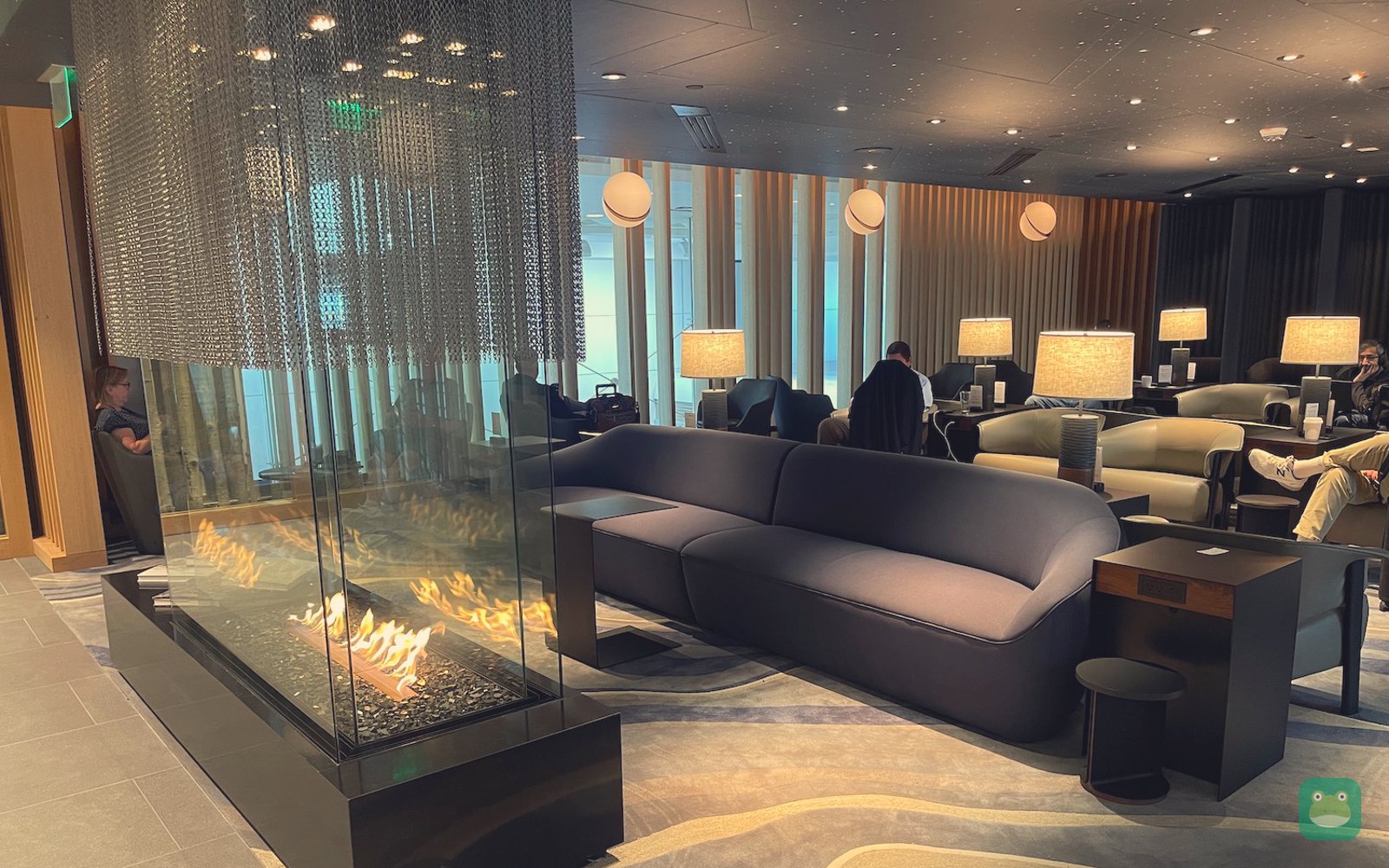 American Airlines Admirals Club, DEN Concourse C — fireplace seating