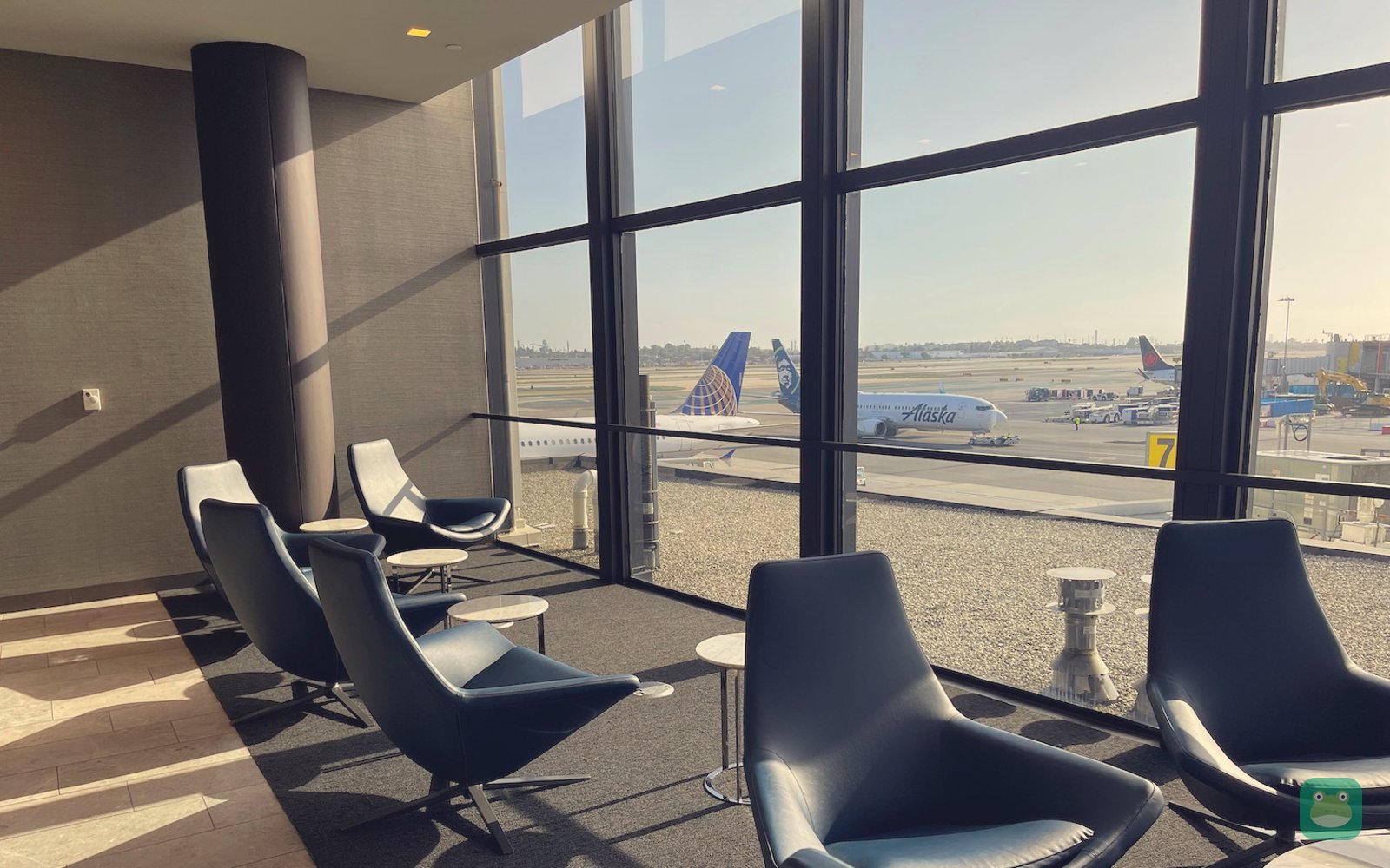 United Polaris Lounge, LAX Terminal 7 — seating with apron views